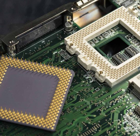 Foto: Mainboard mit CPU Chip und Sockel Foto: Mainboard mit CPU Chip und Sockel